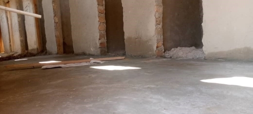 Hurst Expedition 2024 to Cameron's Orphanage 33 repaired toilet floor and walls